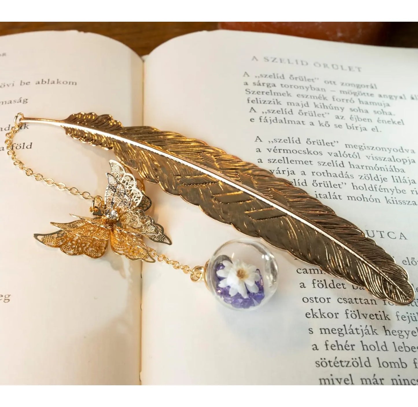 Handcrafted Golden Feather Bookmark with Flower and Butterfly Charm