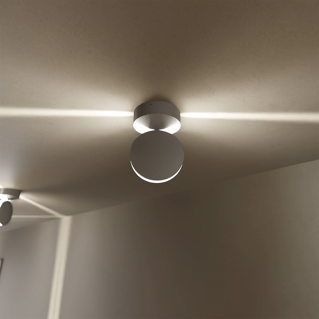 Minimalist Circular Wall Lamp with Adjustable LED Light