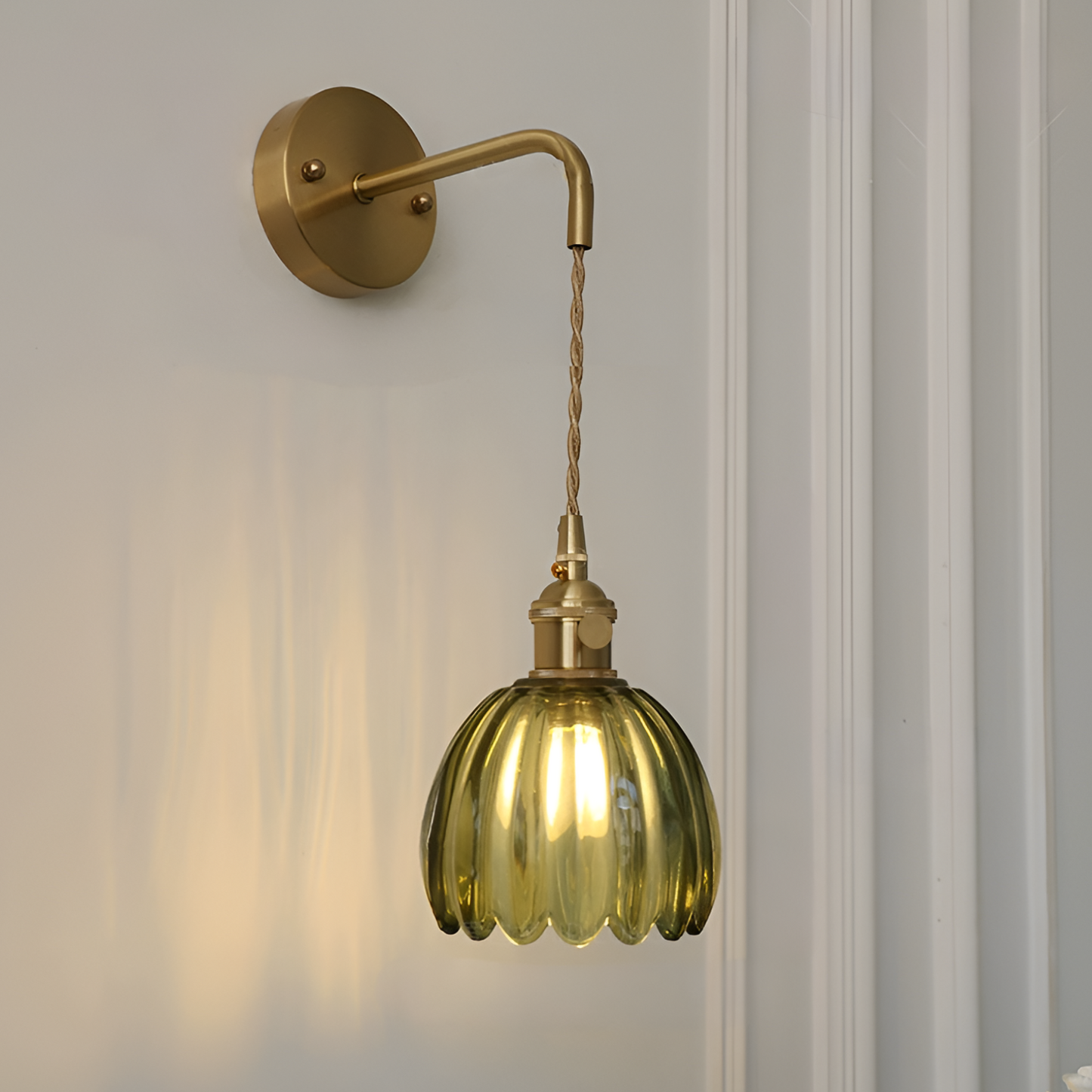 Modern Pink Ribbed Glass Wall Sconce with Brushed Gold Finish