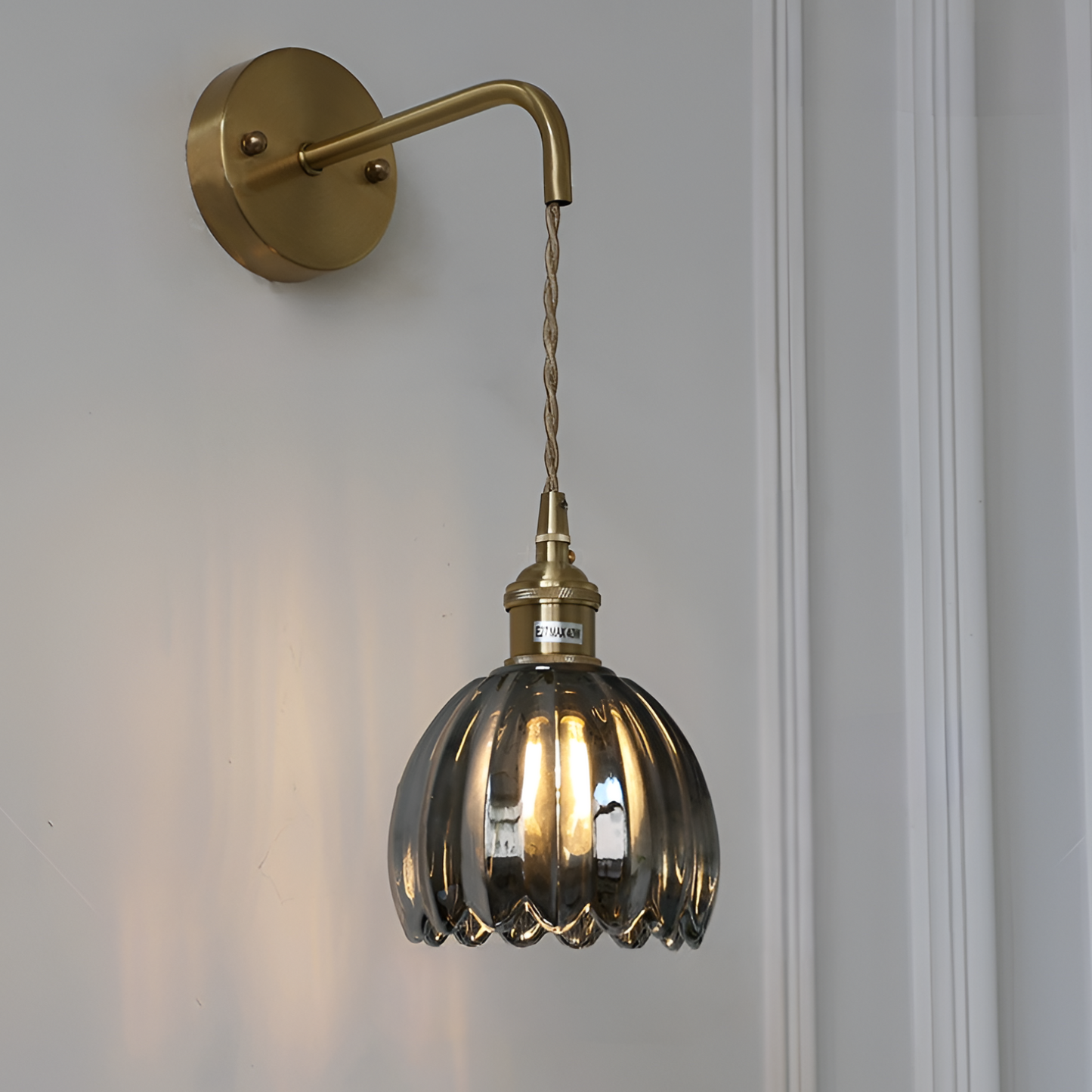 Modern Pink Ribbed Glass Wall Sconce with Brushed Gold Finish