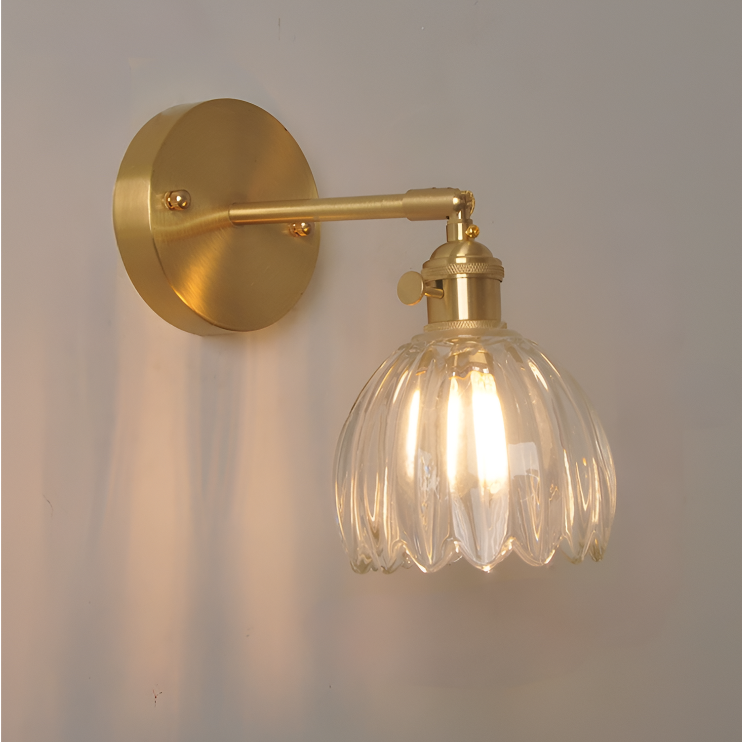 Modern Pink Ribbed Glass Wall Sconce with Brushed Gold Finish