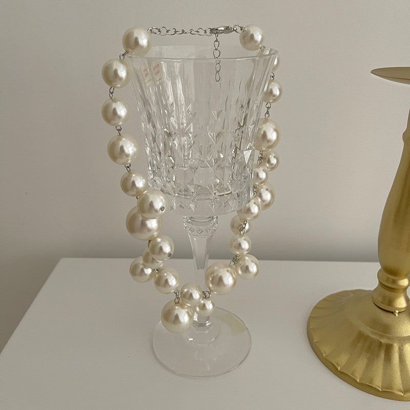 Classic Round Pearl Necklace with Modern Twist
