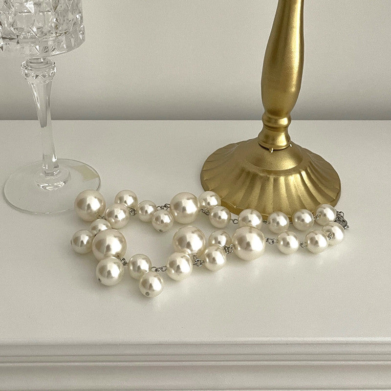 Classic Round Pearl Necklace with Modern Twist