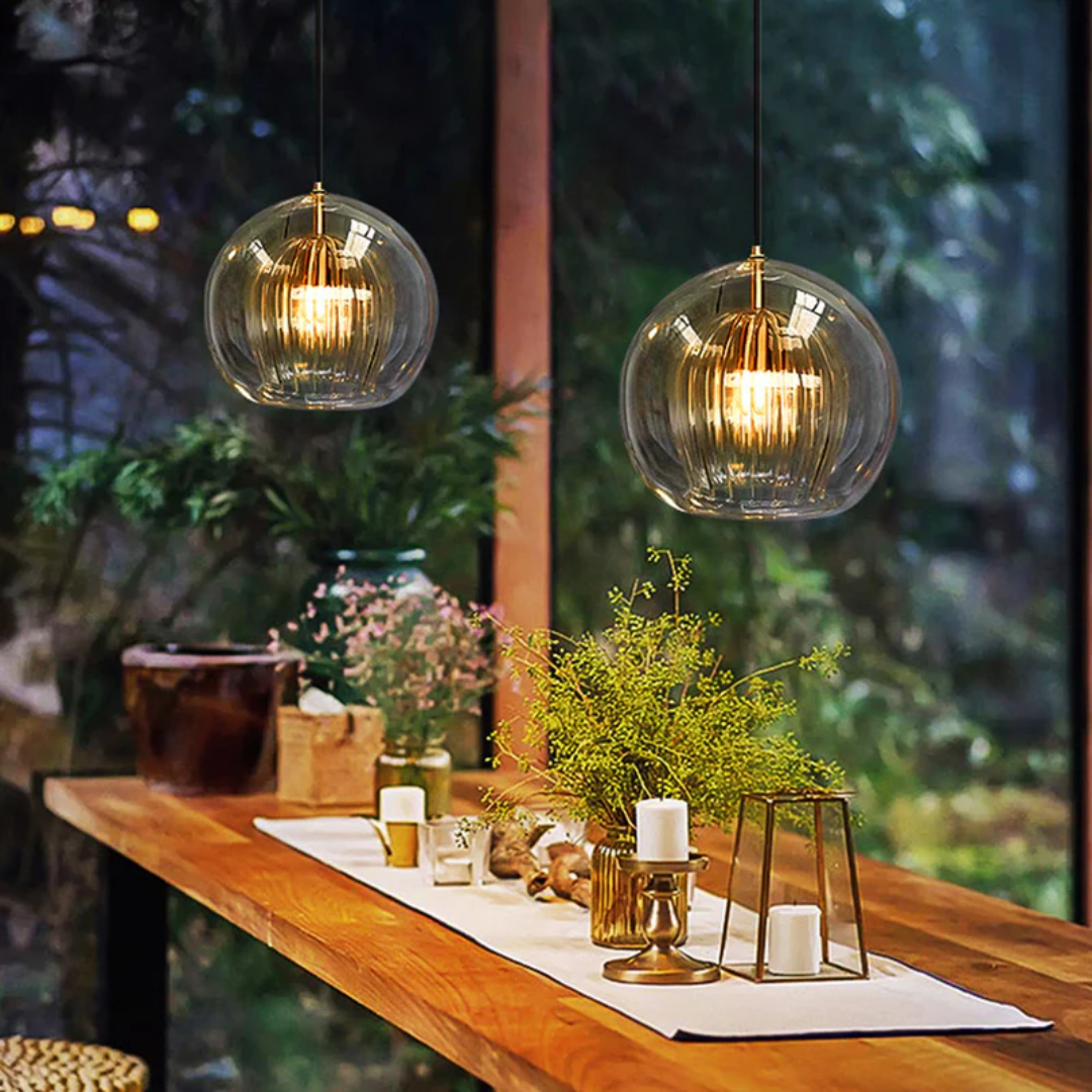 Modern Adjustable Spherical LED Pendant Light in Clear or Amber Glass