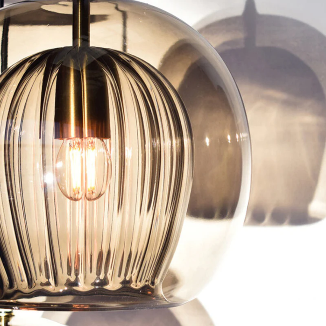 Modern Adjustable Spherical LED Pendant Light in Clear or Amber Glass