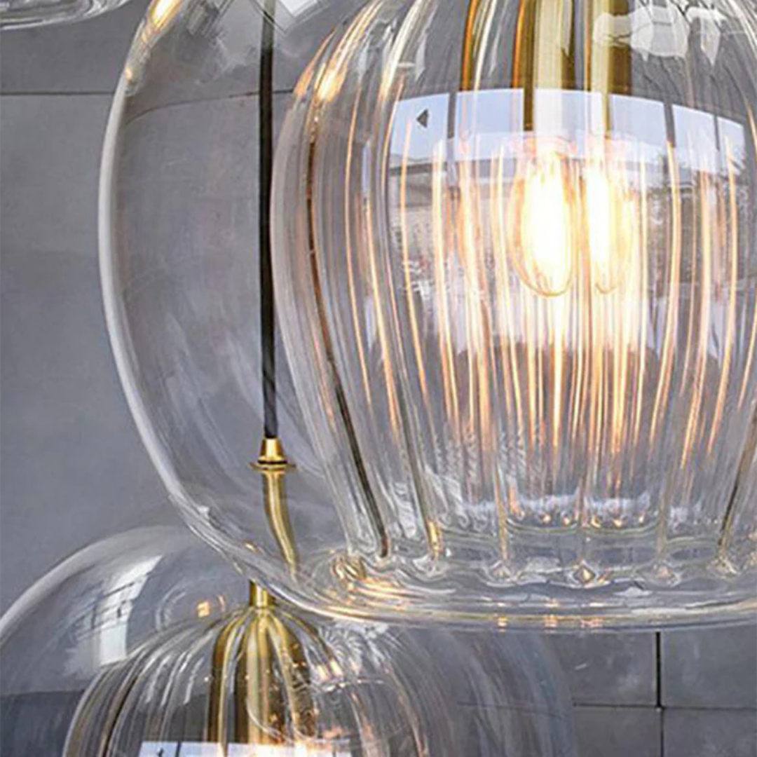 Modern Adjustable Spherical LED Pendant Light in Clear or Amber Glass