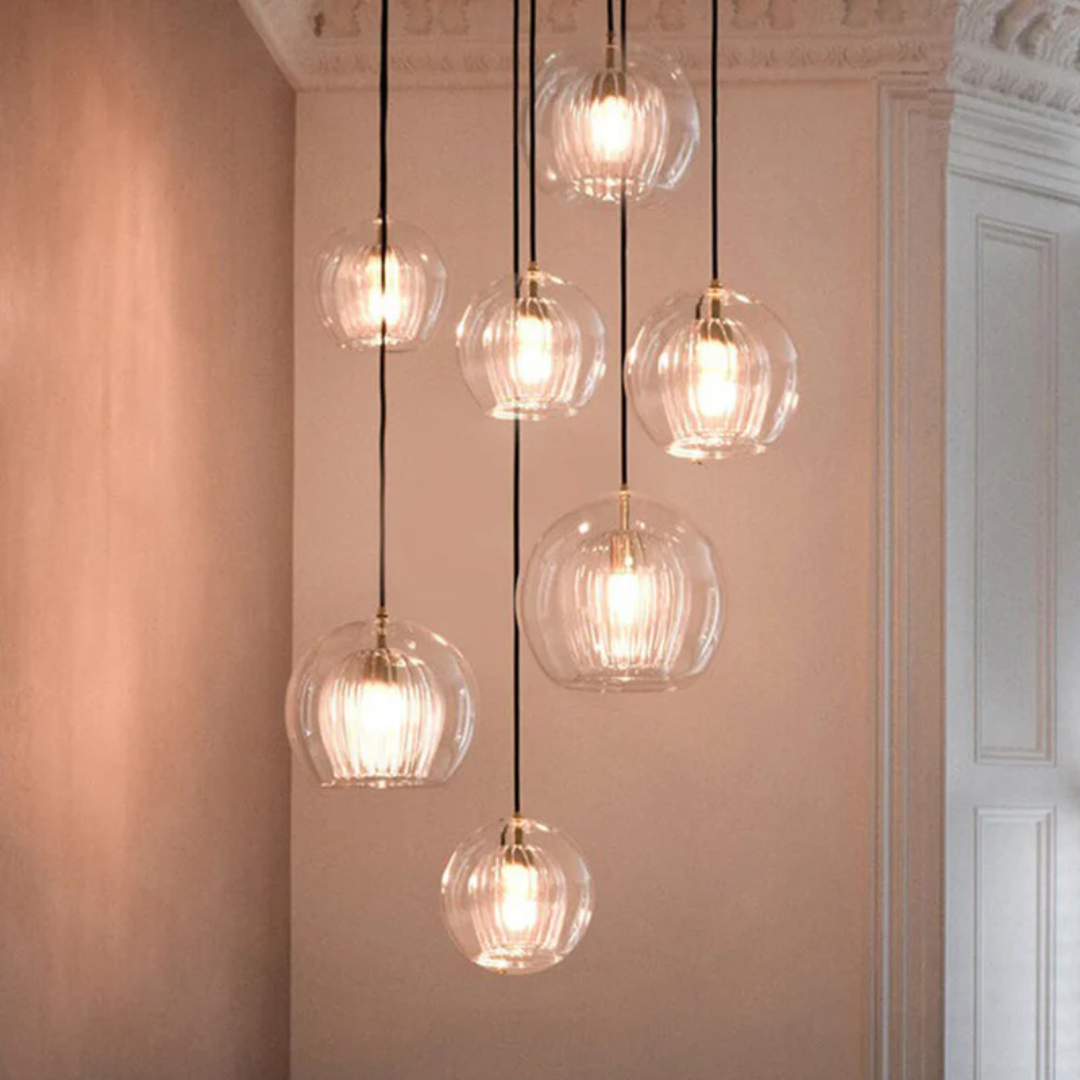Modern Adjustable Spherical LED Pendant Light in Clear or Amber Glass