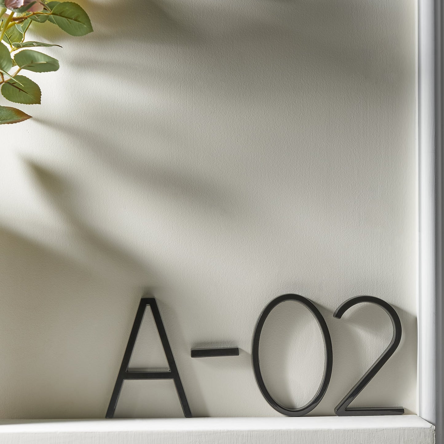 Modern Black House Numbers with Floating Design