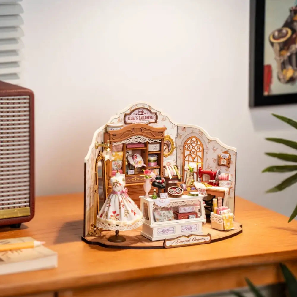 Miniature Tailoring Shop Diorama with Sewing Machine and Fabrics