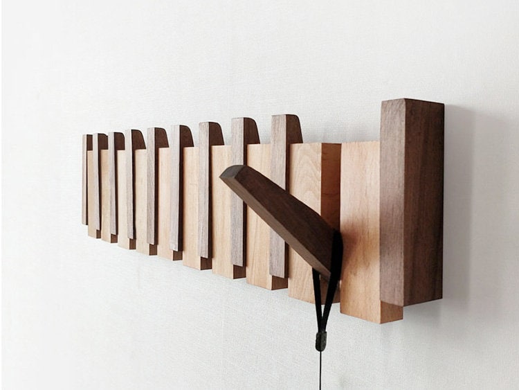 Piano-Inspired Wooden Coat Rack with Foldable Hooks