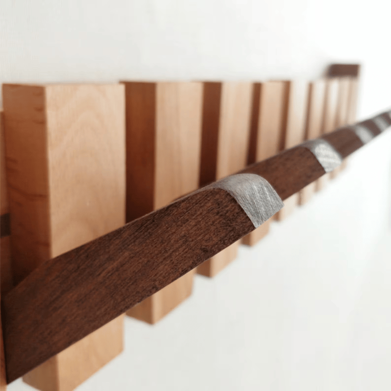 Piano-Inspired Wooden Coat Rack with Foldable Hooks